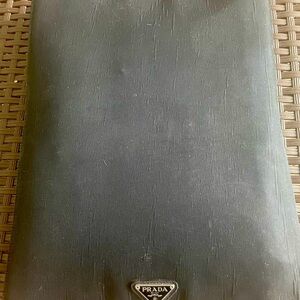 VINTAGE PRADA DOCUMENT HOLDER. BLACK NYLON OUTER, CALFSKIN LEATHER INTERIOR.